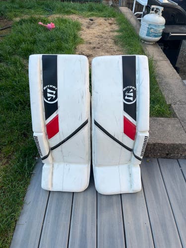Used 30" Warrior  Ritual G5 Goalie Leg Pads