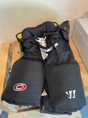 Senior Used Warrior Franchise Pro Stock pants, Carolina hurricanes