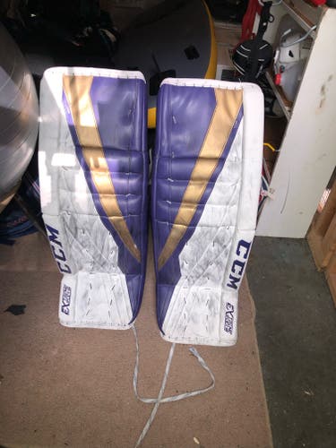 Used NCAA 34+1 CCM Eflex lll Goalie Pads Purple and Gold