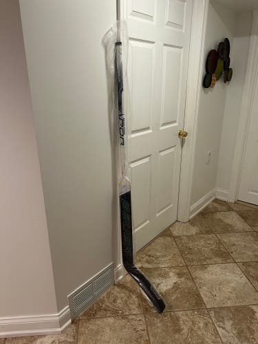 Brand new Regular 25" Paddle Hyperlite Goalie Stick and Used Stick