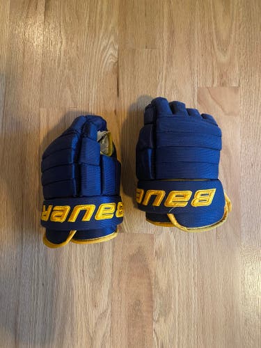 Bauer navy and yellow hockey gloves used