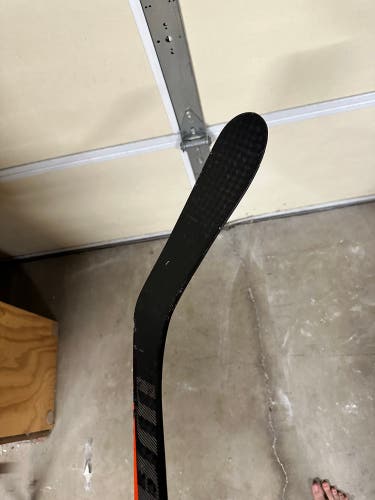 USED WARRIOR HOCKEY STICK [see description]