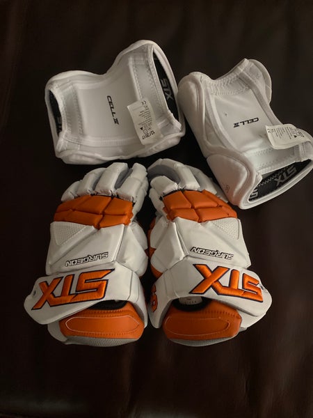 Bundling Stx white surgeon gloves 13” and Stx Xl Elbow pads. / small hole