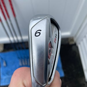 Men's 9 Iron Regular Flex Steel Shaft R11, With Red Grips.