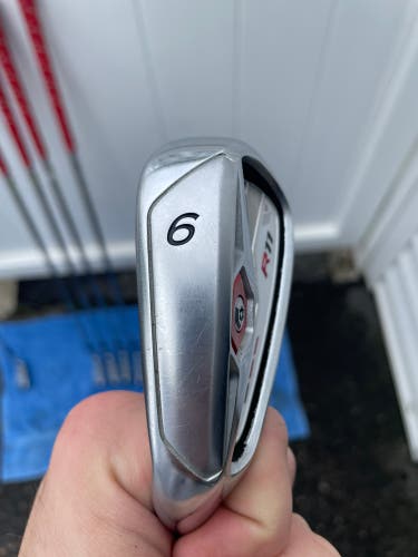 Men's 9 Iron Regular Flex Steel Shaft R11, With Red Grips.