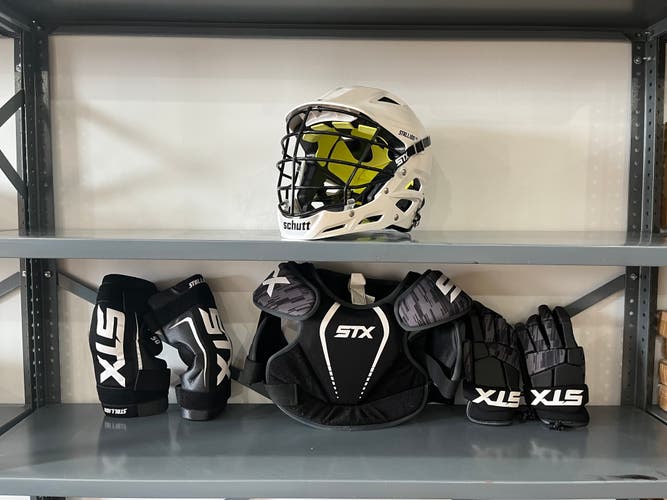 Used Player's STX Stallion 100 Youth Starter Kit - Helmet, chest pads, elbow pads, gloves