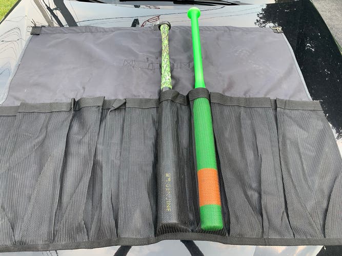 Dugout bat holder
