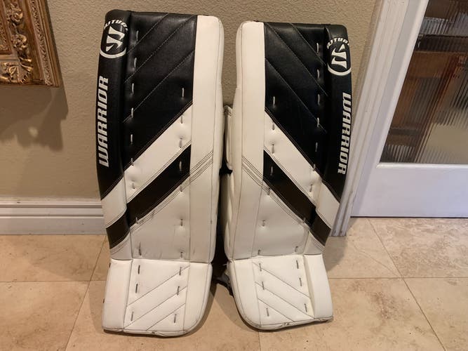 Used Intermediate Warrior Ritual G4 Goalie Leg Pads White & Black Size 30+1