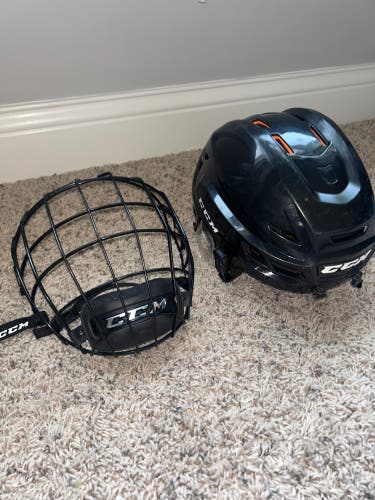 Used Large CCM  Tacks 710 Helmet ( CAGE INCLUDED)