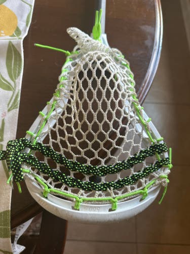 hammer 500 lacrosse defense head fully strung with a dragonfly 7 with a flex of 5