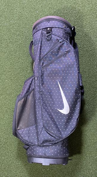 nike backpack polka dots Hayward x Doernbecher Freestyle 'Hailey' DTLR Haul loop at top Padded shoulder straps Zippered main compartment Zippered front pouch Polyester Machine wash Imported SIZE Black and White Polka Dot