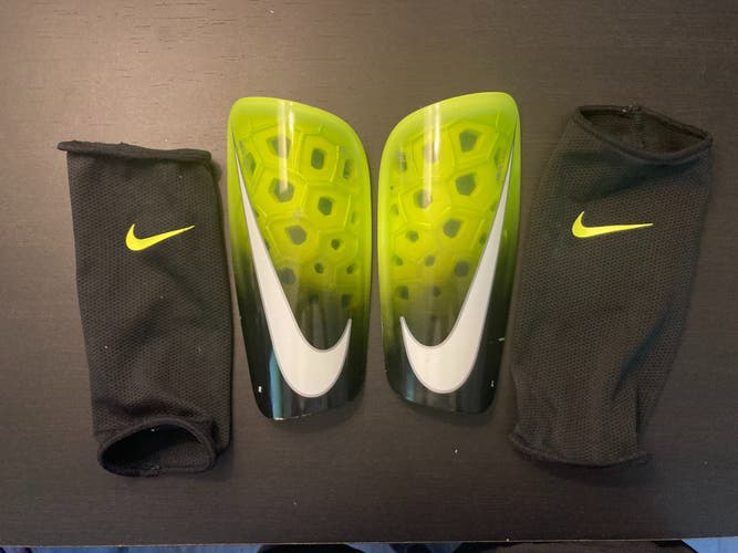 Used Unisex Medium Nike Mercurial lite Shin Guards; Black and Green