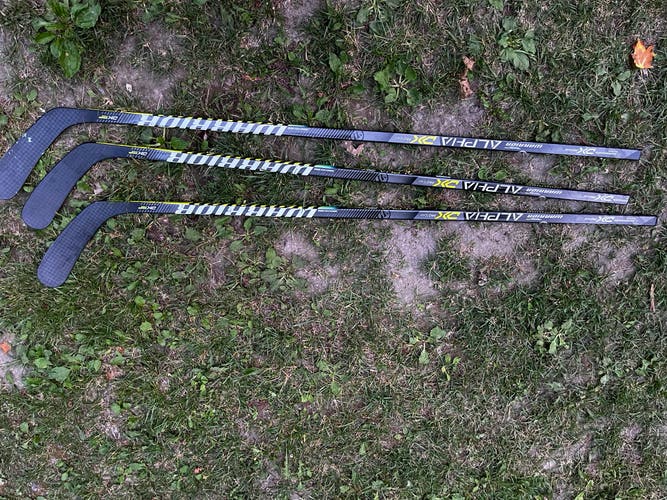 3 Used Warrior alpa dx pro team stick