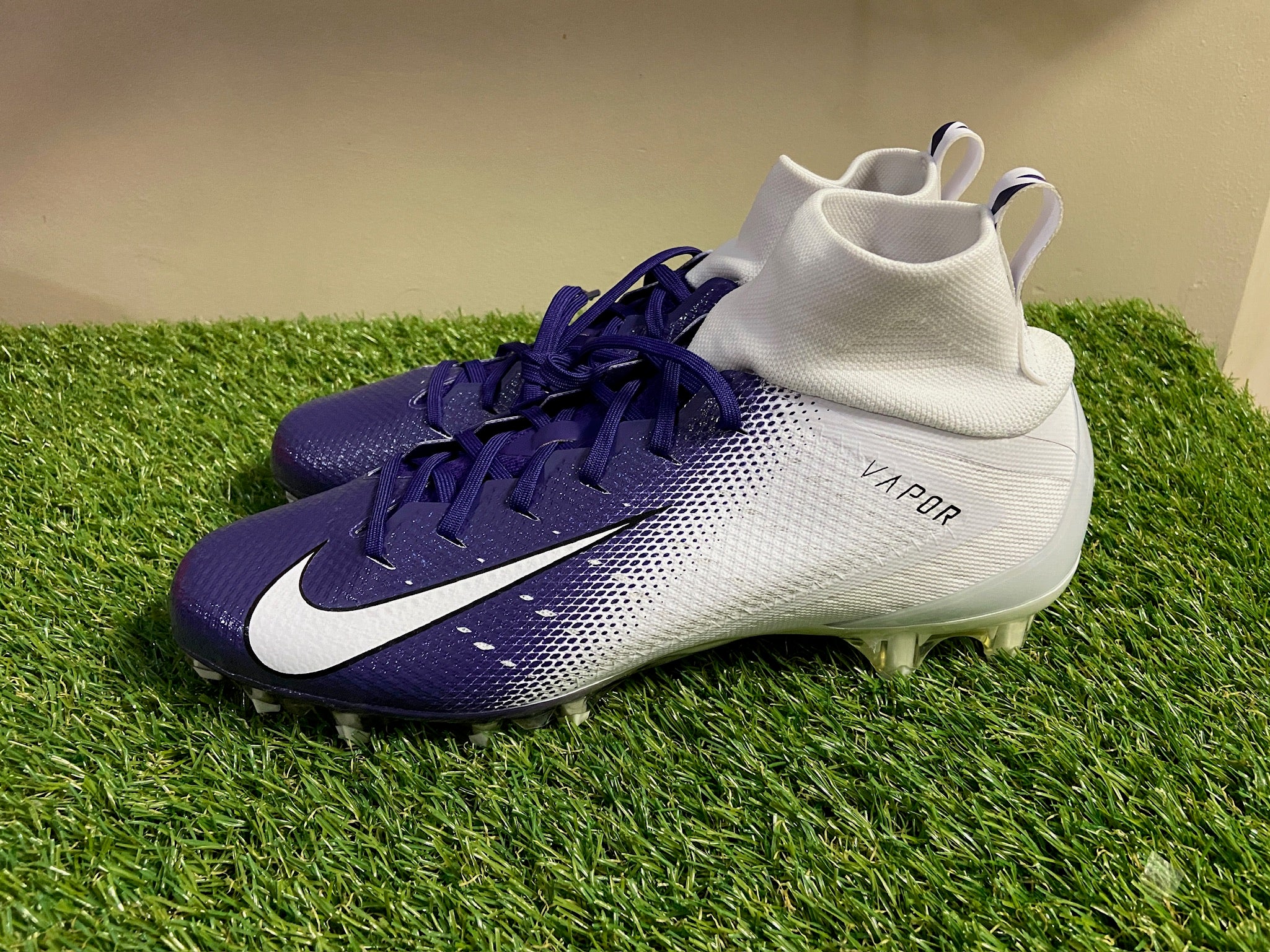purple and white nike football cleats