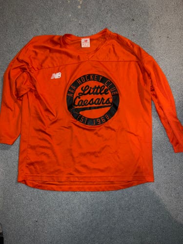 Lightly Used Orange Medium New Balance Jersey