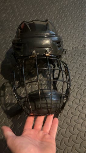 Used Medium Bauer  Re-Akt 100 Helmet With Cage