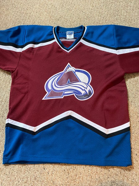 Colorado Avalanche Vintage Starter Jersey - any idea if this is genuine?  All the ones I've seen the piping is navy not black, and the stitching  doesn't seem the highest quality. Thank