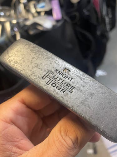 Knight Youth size golf putter in right hand