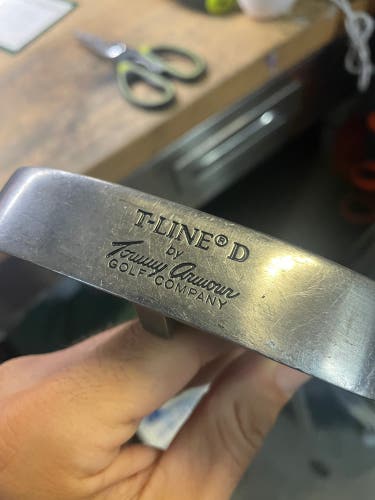Tommy Armor T line putter butterfly edition in right hand