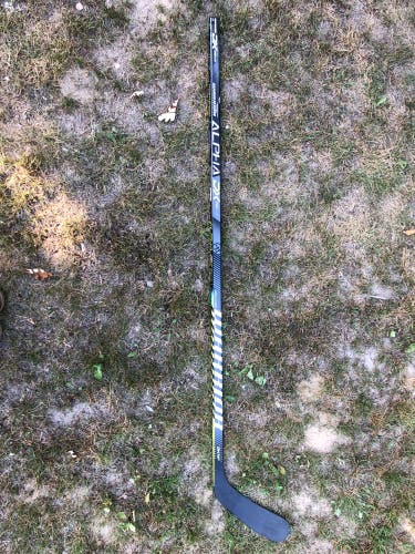 Used Warrior Alpha Dx Pro Team Stick