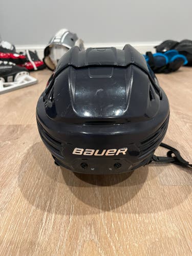 Used Bauer Re-Akt 200 helmet size medium.