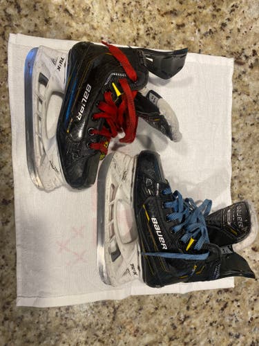 Junior Used Bauer Supreme M5 Pro Hockey Skates Regular Width Size 1.5