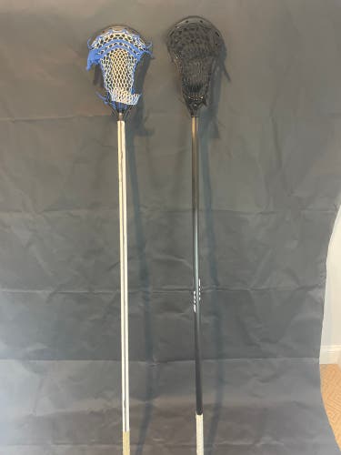 2 D-Pole lacrosse sticks