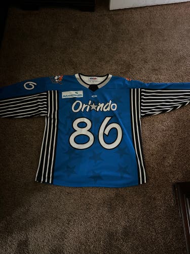 Brand new Special orlando magic themed hockey jersey issued to jake coughler