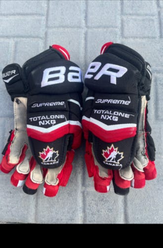 One Bauer helmet and two gloves