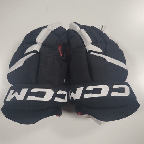 New Junior CCM Next Gloves 12" black