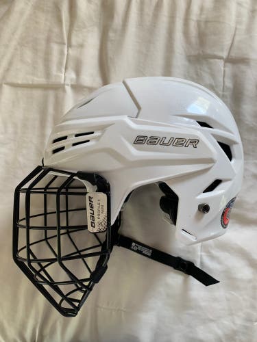 Used Medium Bauer  Re-Akt 95 Helmet + Cage