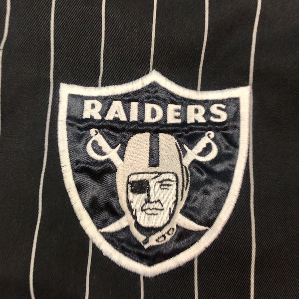 90s LA Raiders vintage NFL button front jersey. Large