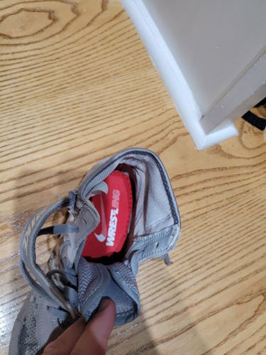 Used Nike youth size 2.5 Speed Sweep Wrestling Shoes.