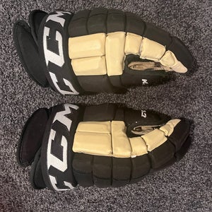Used CCM HG98 Gloves 14"