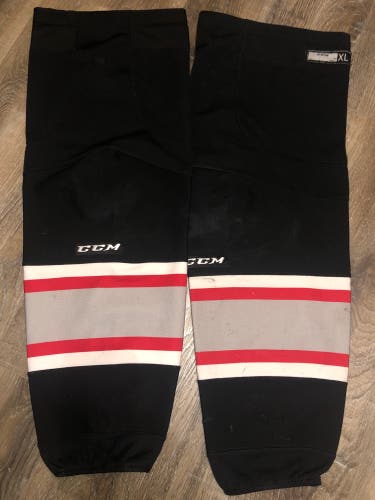 USED CCM  BRAMPTON BEAST   CCM XL BLACK  GAME WORN SOCKS