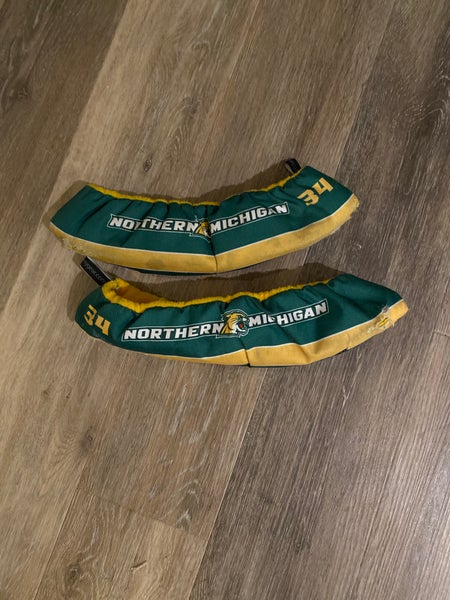 NMU hockey skateguards