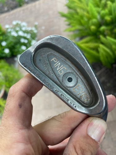Ping Eye2 iron 3 in right hand