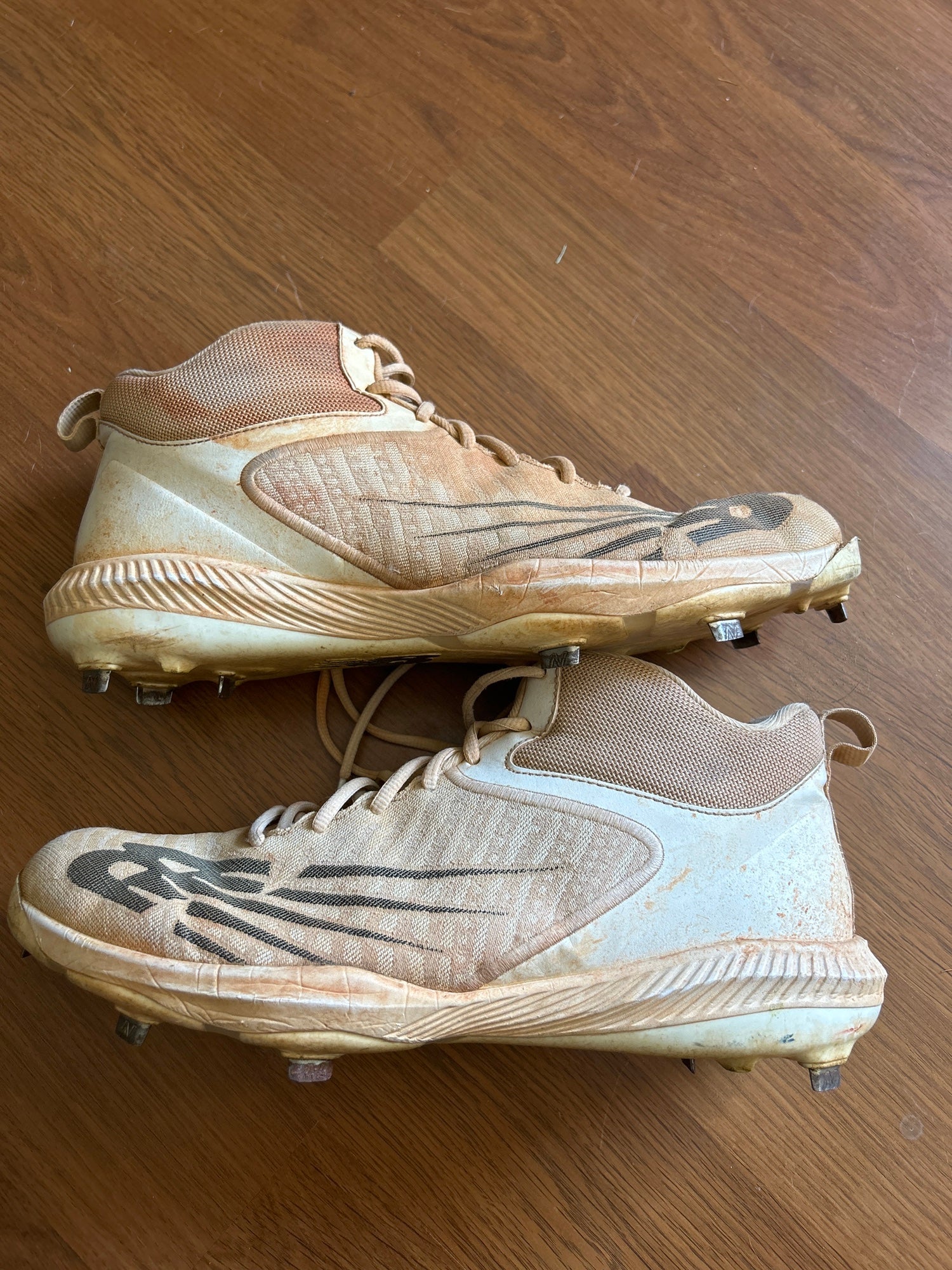 gold new balance metal cleats
