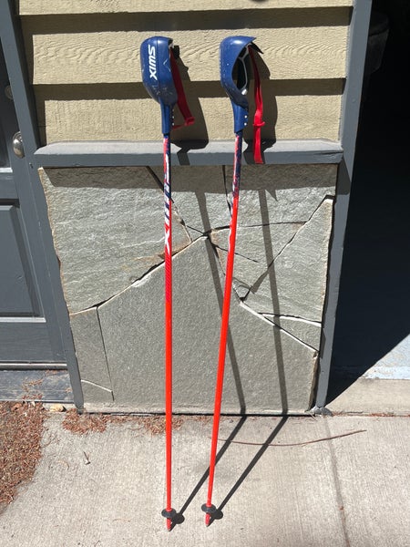 Used 54in (135cm) Swix Racing SL Ski Poles with pole guards.