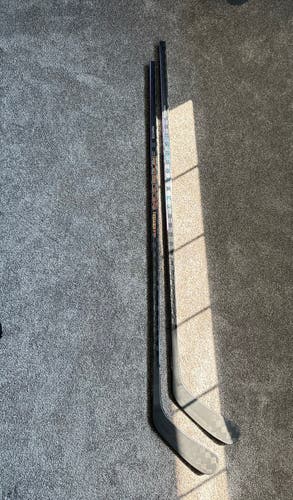 2 Stick Bundle NEW “CCM”Ribcor Trigger 7 LH 65 Flex P29 Dressed Pro Blackout sticks.