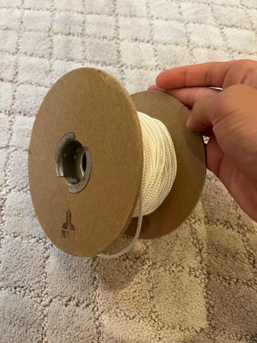 Used Jimalax Spool of White Sidewall Strings