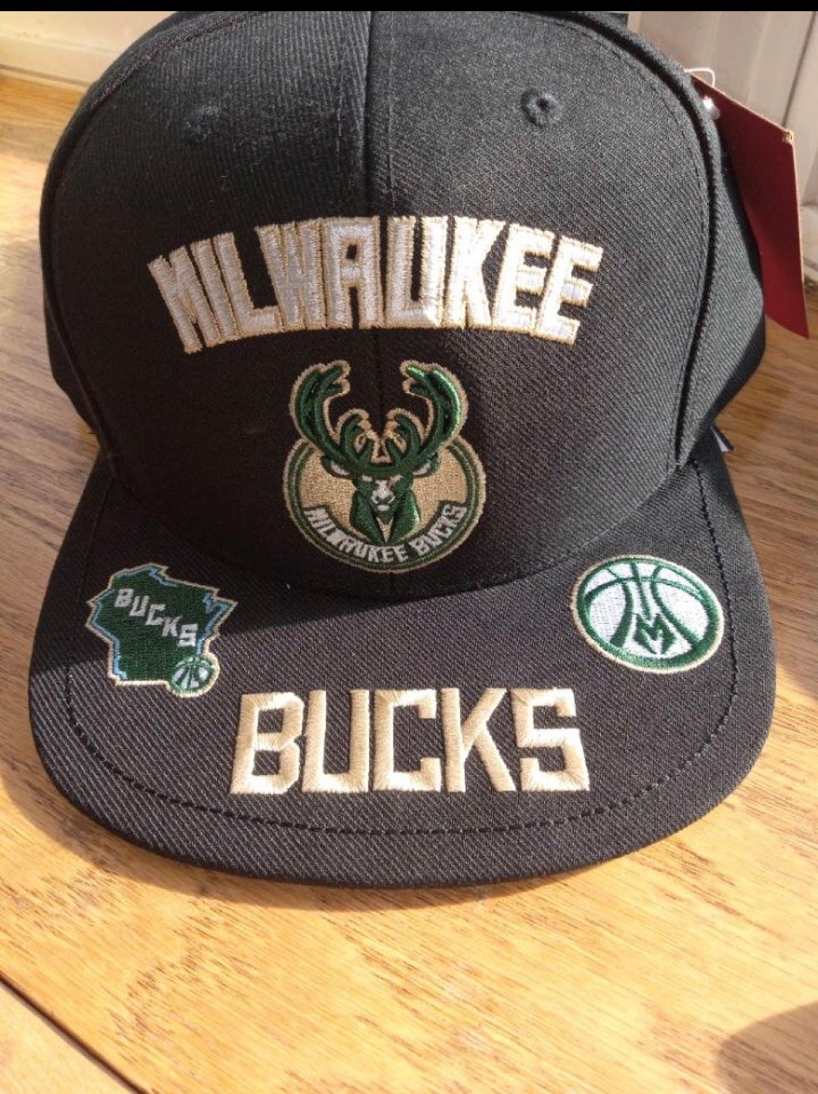 Shop Mitchell & Ness Milwaukee Bucks On The Block Snapback Hat  6HSSSH21297-MBUGNBK multi