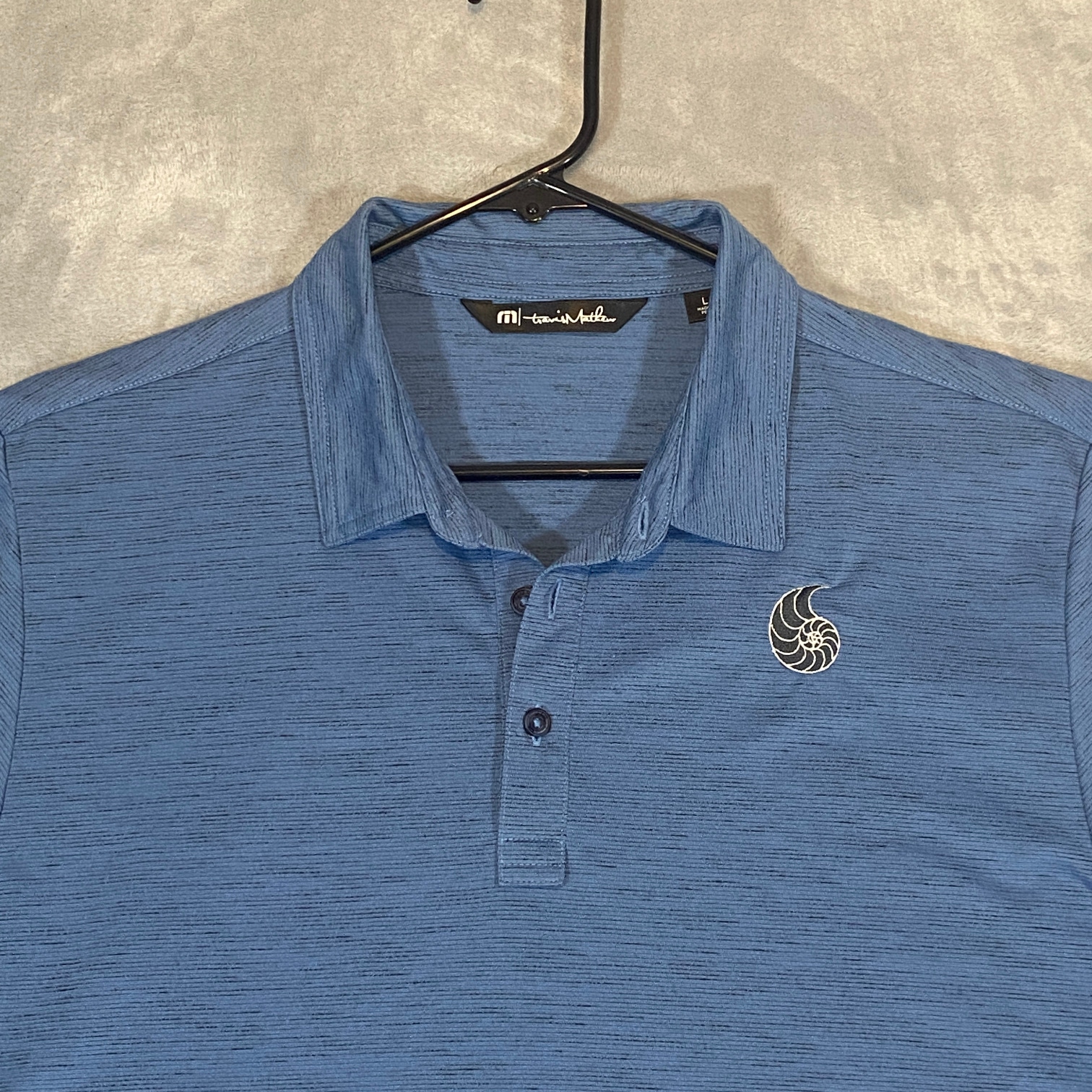 Travis Mathew Golf Polo Shirt Mens Large Blue Short Sleeve Neck & Nautilus Logos