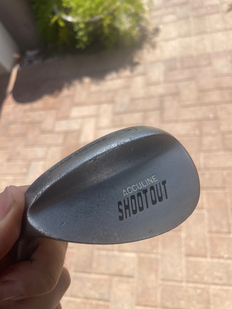 Shootout golf sand wedge in left hand , steel shaft