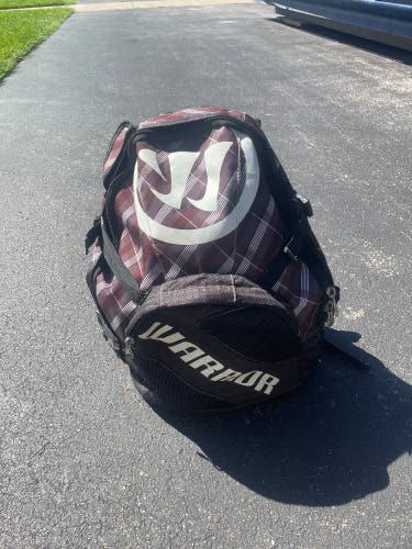 Warrior lacrosse backpack with stick holder