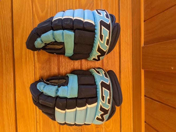 Used CCM HG4PC Gloves 12" -Navy/Carolina