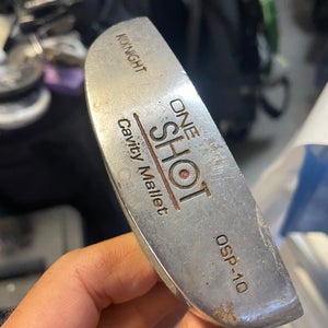 knight one shot golf putter in right hand