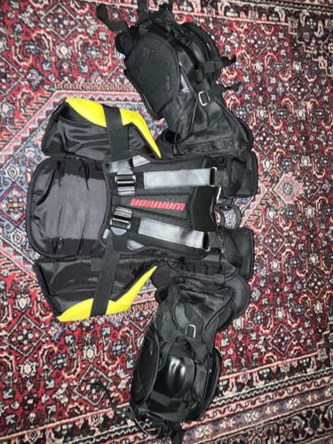 Used Intermediate Small/Medium Warrior RX3E Goalie Chest Protector