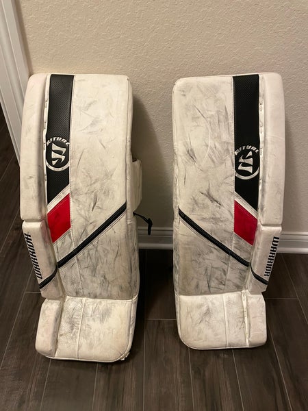 Used 32" Warrior Ritual G5 Goalie Leg Pads