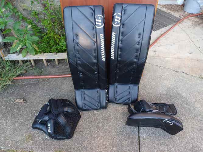 Used 32" Warrior Ritual G4 Goalie Leg Pads + Blocker + Glove